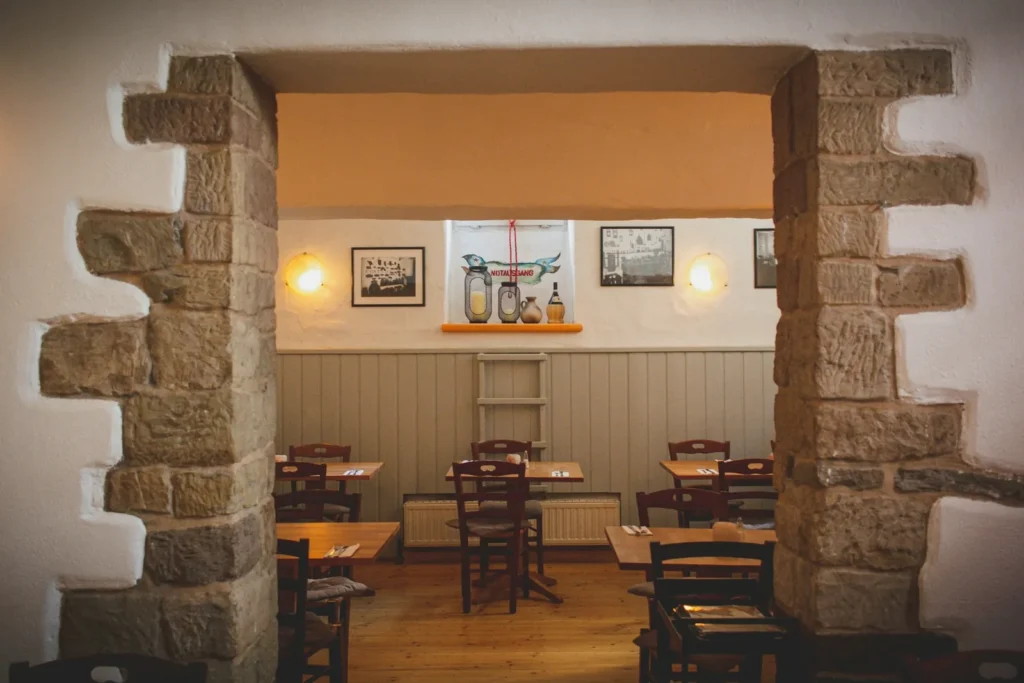 Dining room seen through a stone doorway