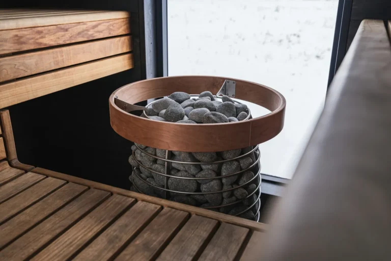 Sauna heater by a snowy window