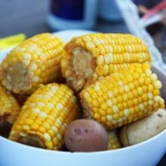 Boiled corn and potatoes