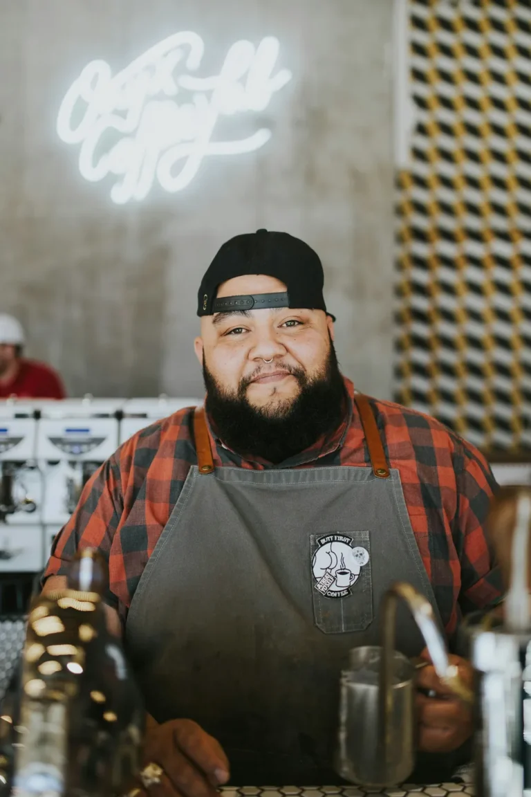Pitmaster in a plaid shirt and apron
