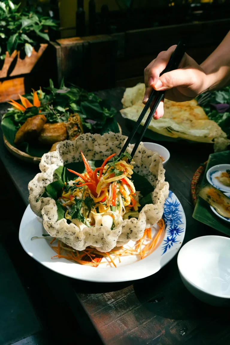 Green papaya salad in a crisp rice basket
