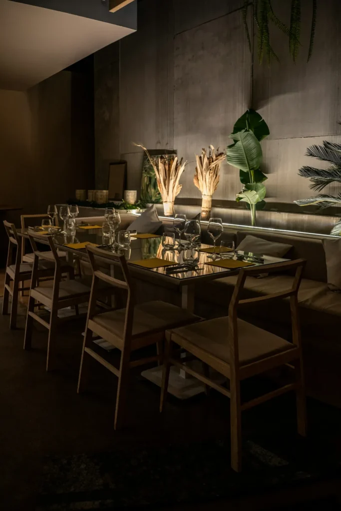 Dining room with warm light and pampas grass