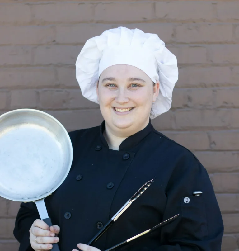 Pastry chef holding a pan