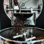 Fresh beans pouring out of the roaster