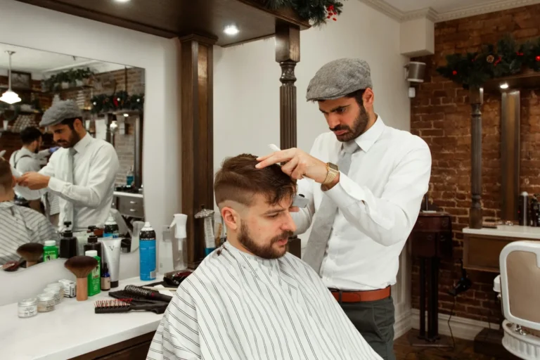 Barbers at work in a busy shop