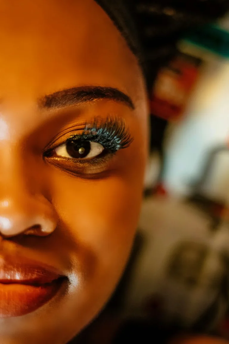 Smiling client with a full lash set