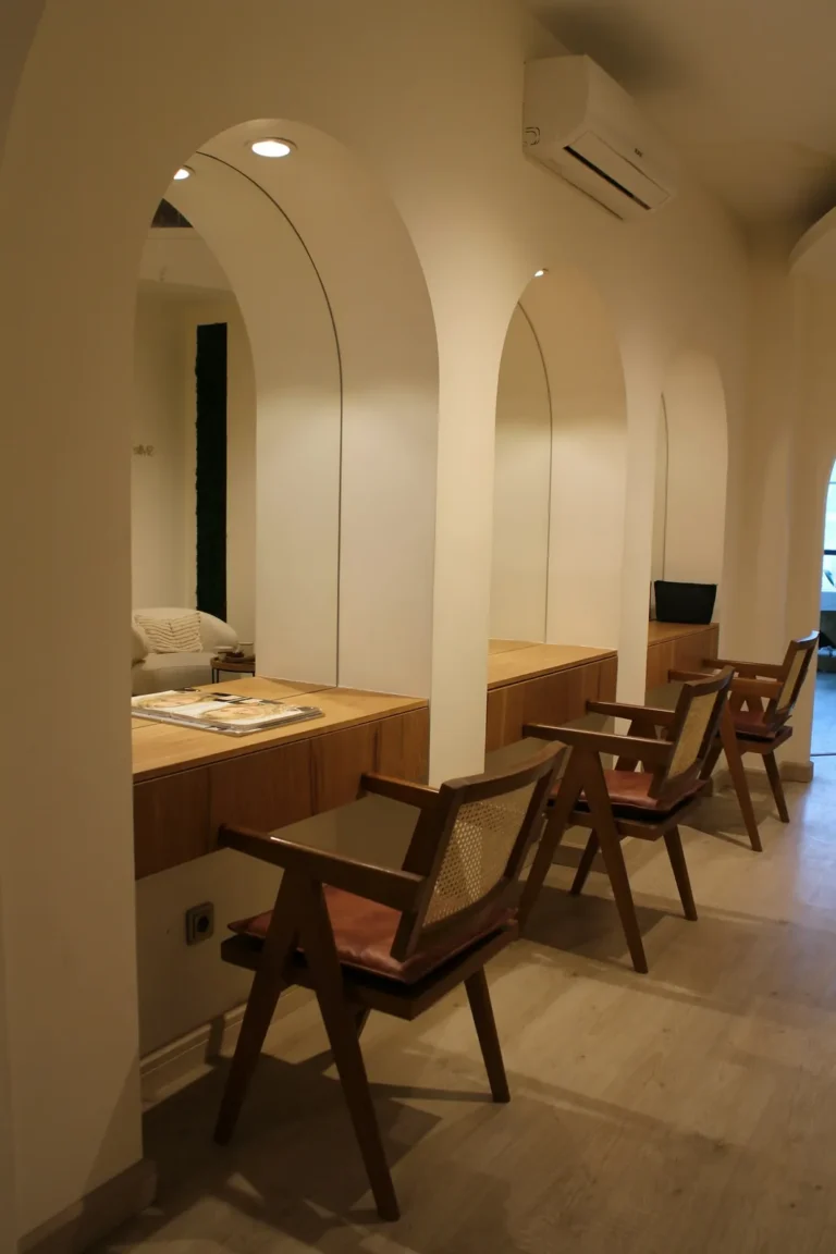 Consultation room with arches and wooden chairs