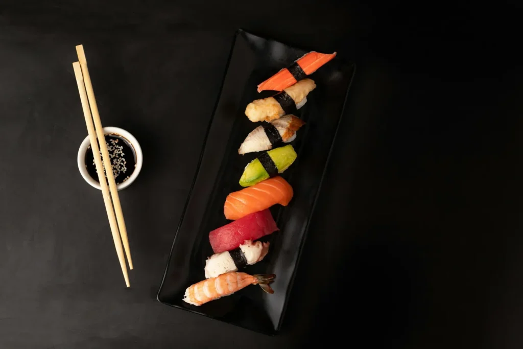 Nigiri set on a long black plate