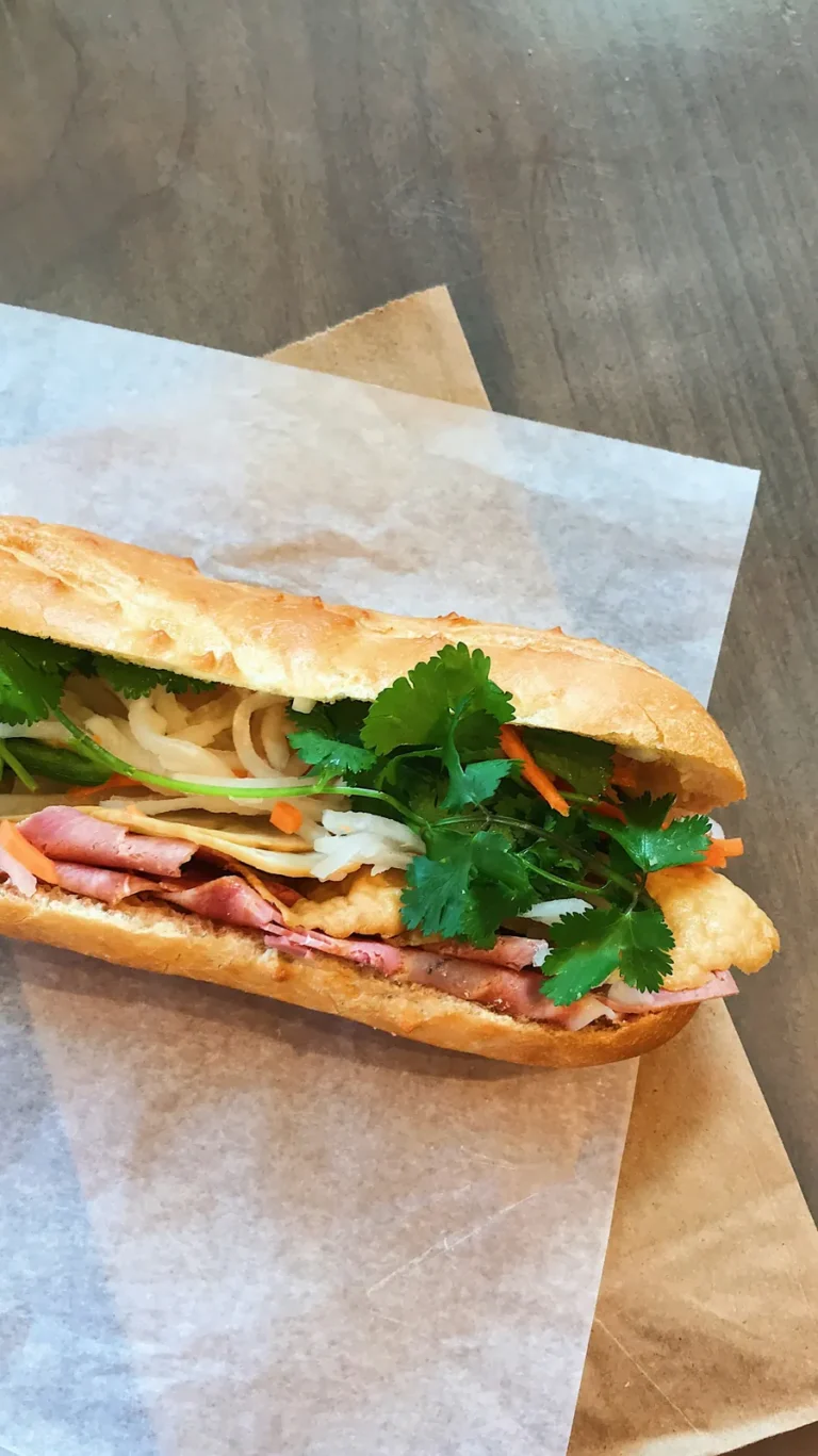 Classic banh mi with cold cuts, pickles and cilantro