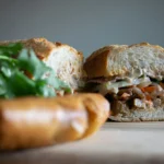 Two banh mi halves with grilled pork