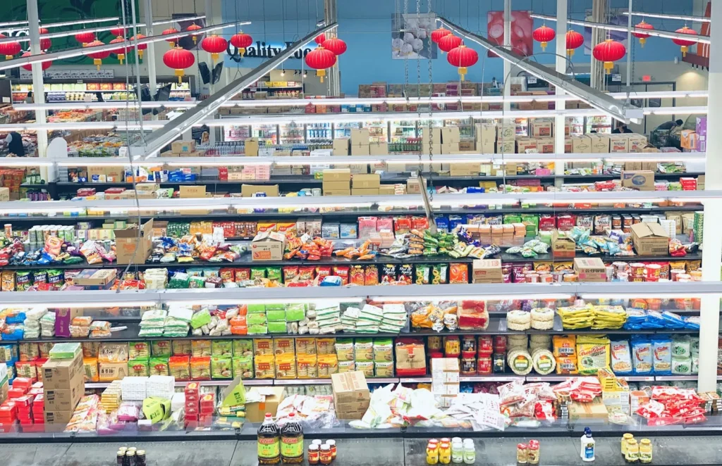 Grocery aisles under paper lanterns