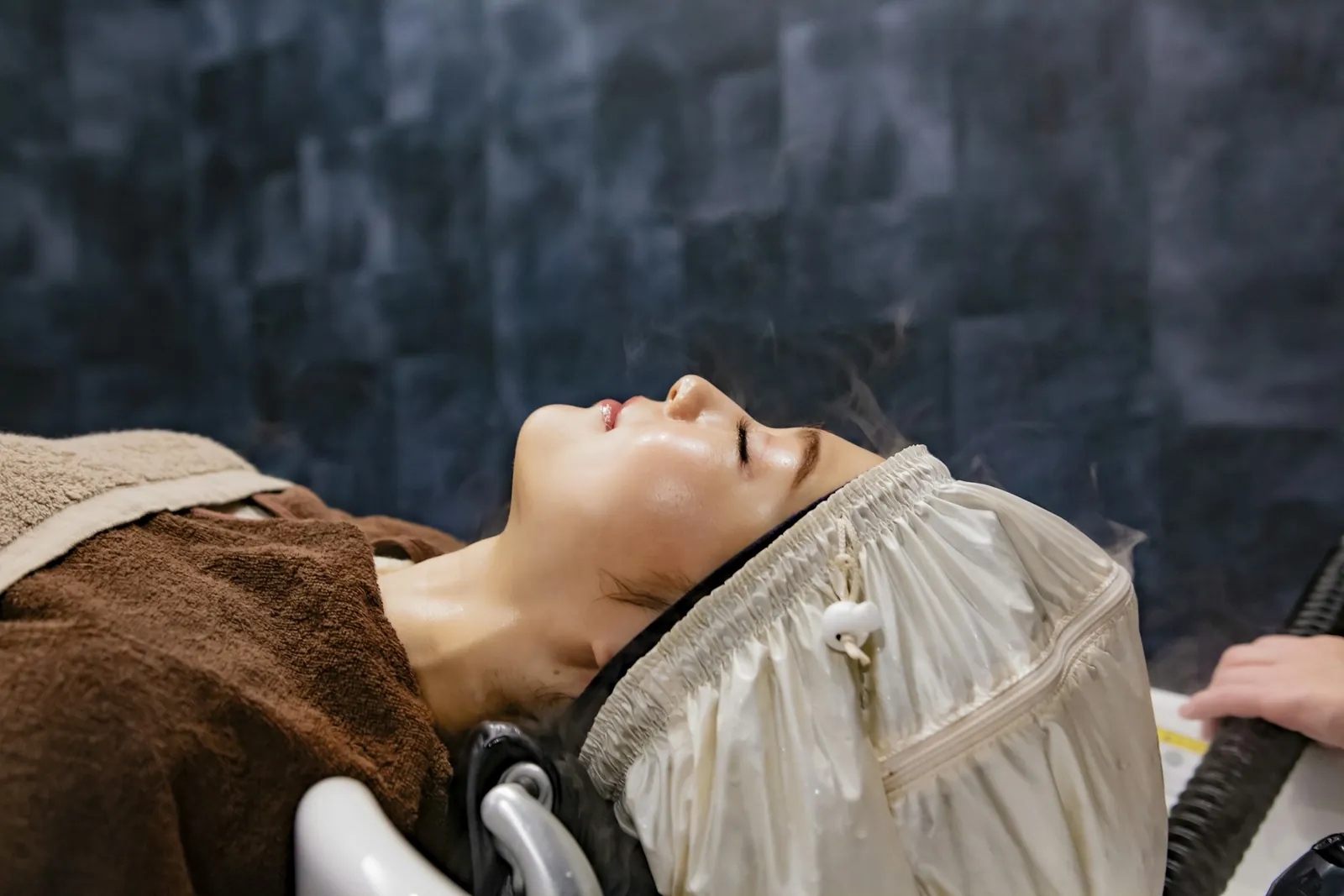 Hair wrapped after a head spa