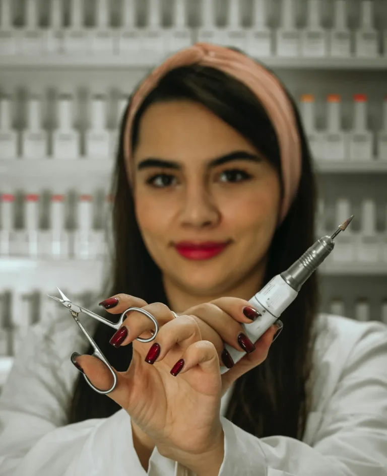 Nail artist with her tools