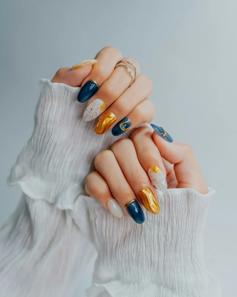 Navy and gold marble nail art
