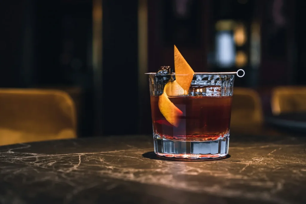Old fashioned on a marble bar table
