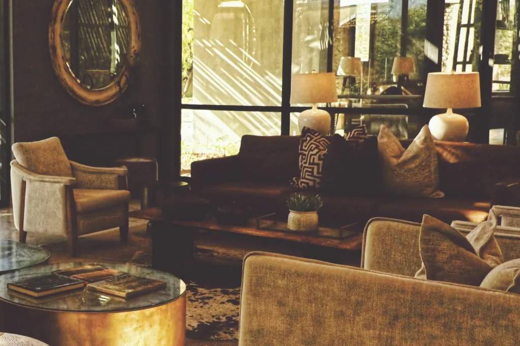 Lounge with velvet sofas and warm lamps