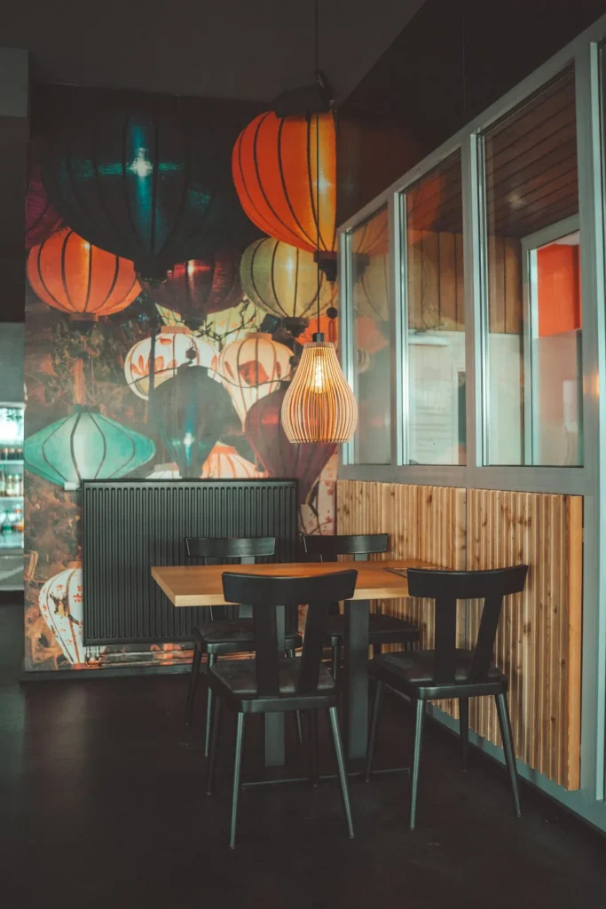Dining room with silk lanterns and wooden tables