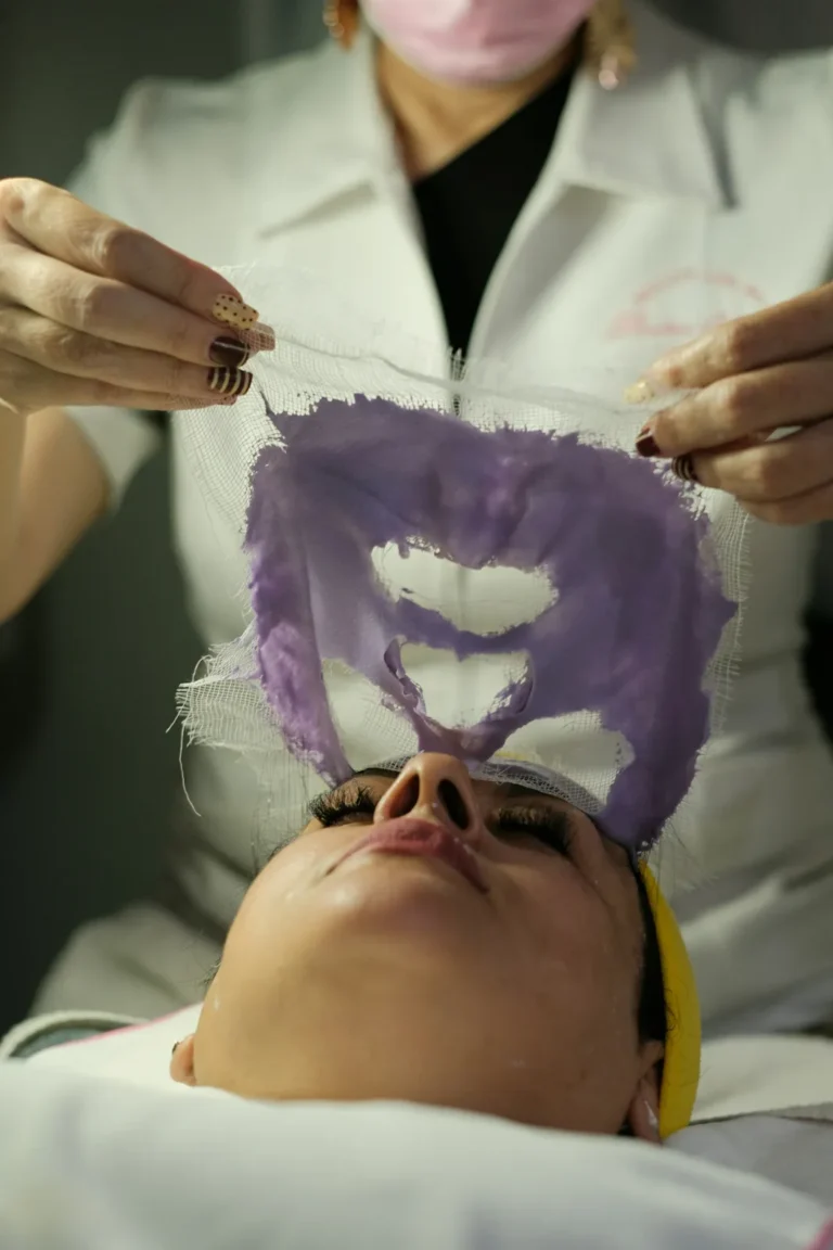 Hands holding a cooling gel mask