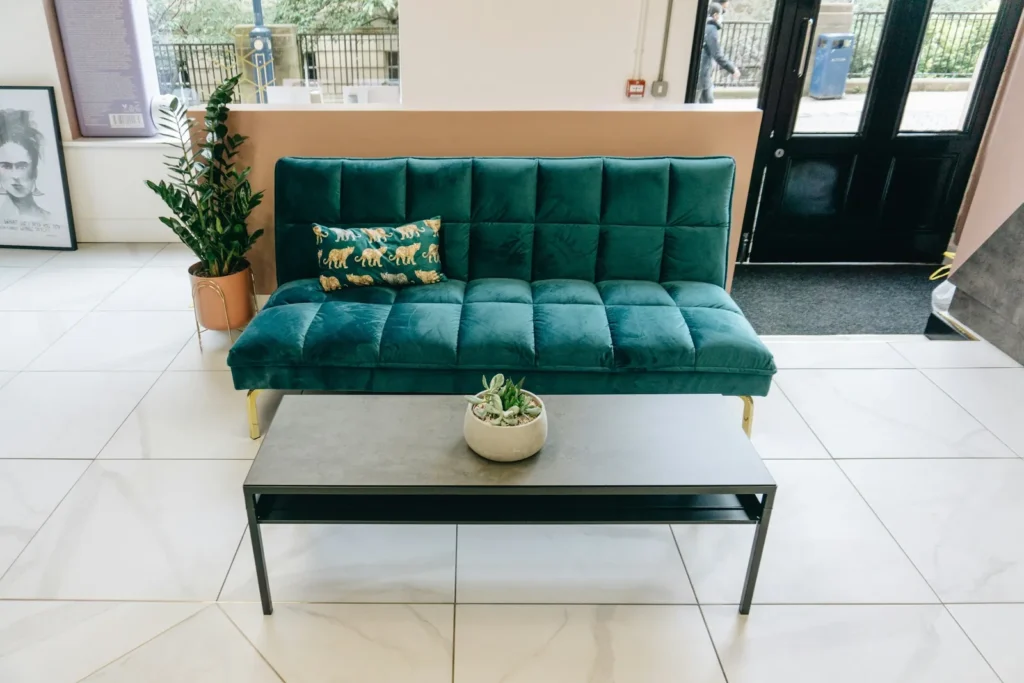 Green sofa in a salon waiting area