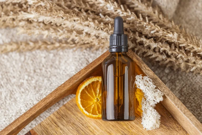 Massage oil with dried orange and flowers