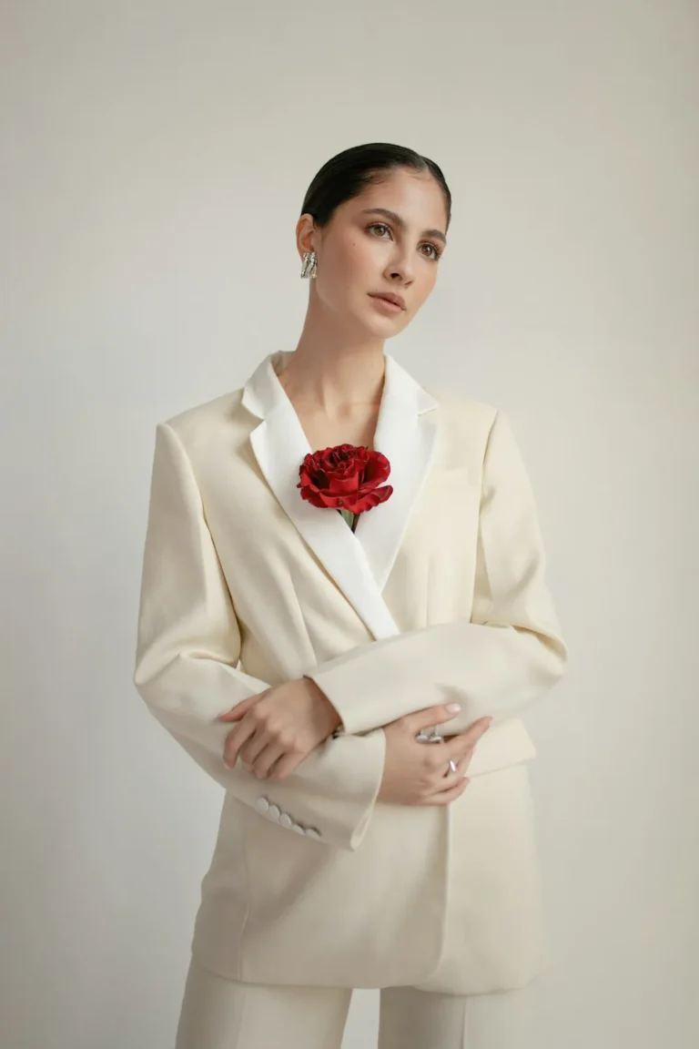 Cream blazer with a red rose